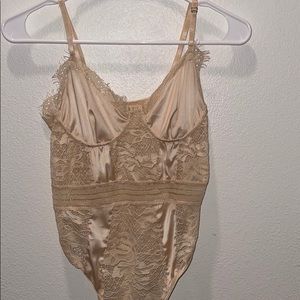 lacy silky bodysuit never been worn!
